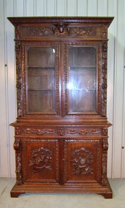 rare 19th c carved oak game and trophy cupboard or bookcase