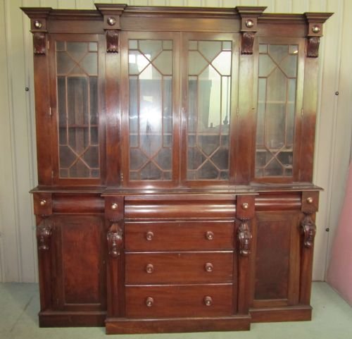 a large victorian mahogany break front bookcase