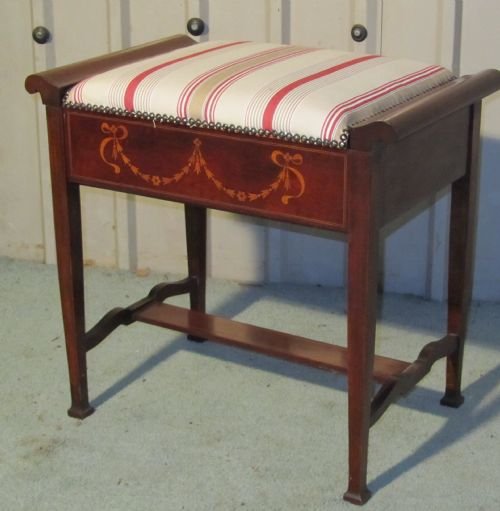 an edwardian inlaid mahogany piano stool