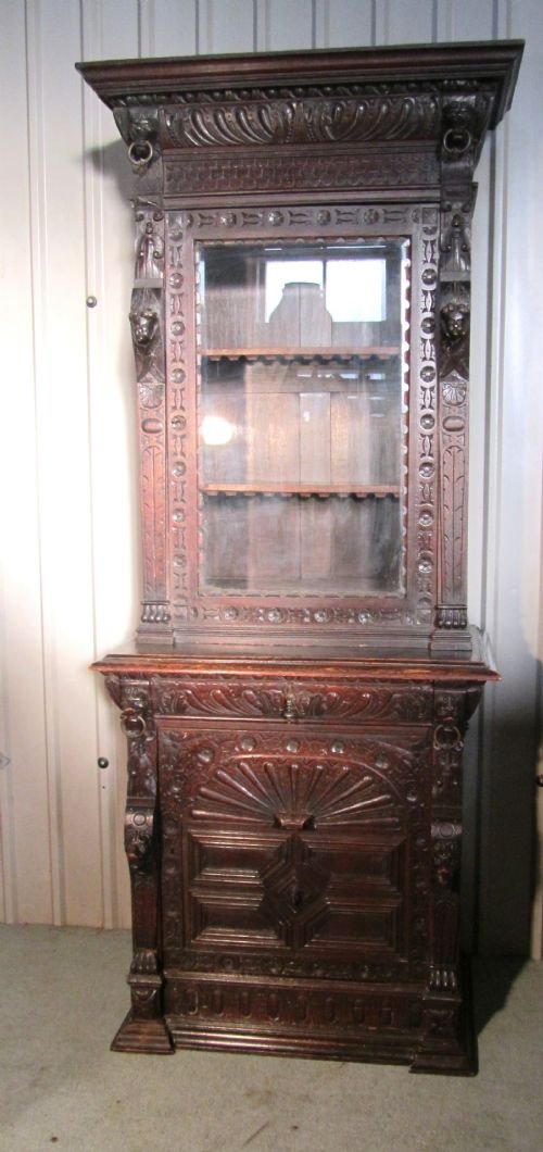 intricately carved early victorian gothic oak bookcase