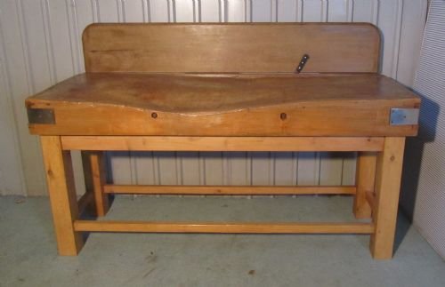 a large french vintage butchers chopping block on stand