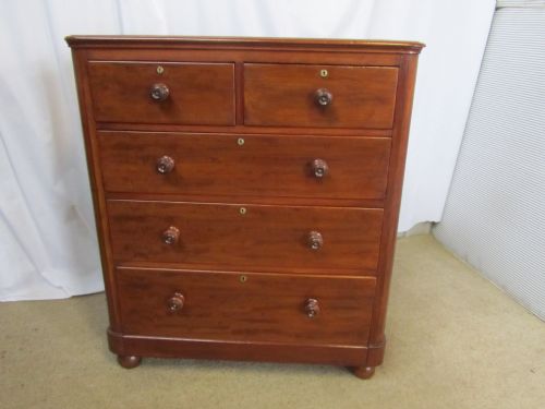 a large victorian mahogany chest of drawers