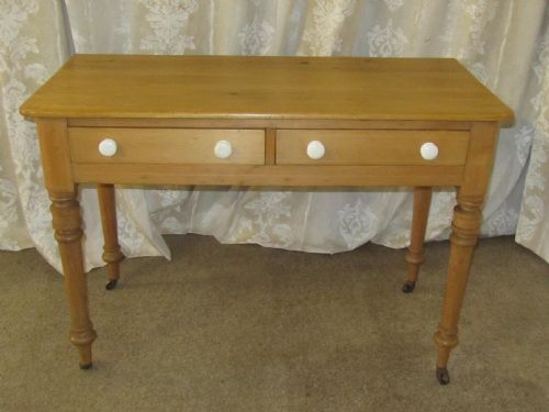 an attractive victorian pine writing or side table