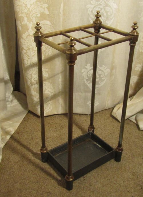 a victorian brass and cast iron walking stick stand or umbrella stand