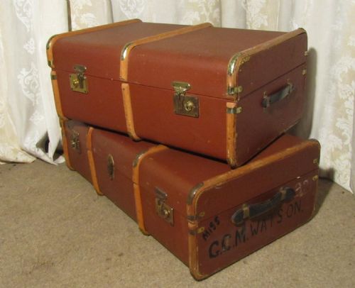 2 vintage canvas travel trunks