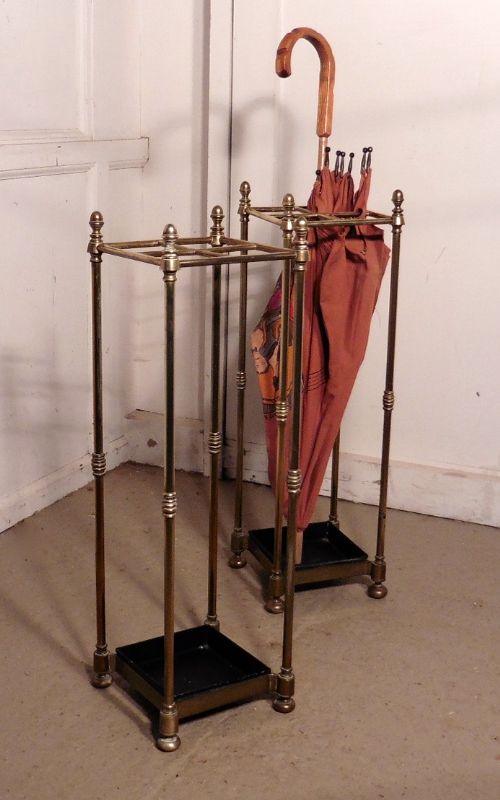a pair of victorian brass and cast iron walking stick or umbrella stands