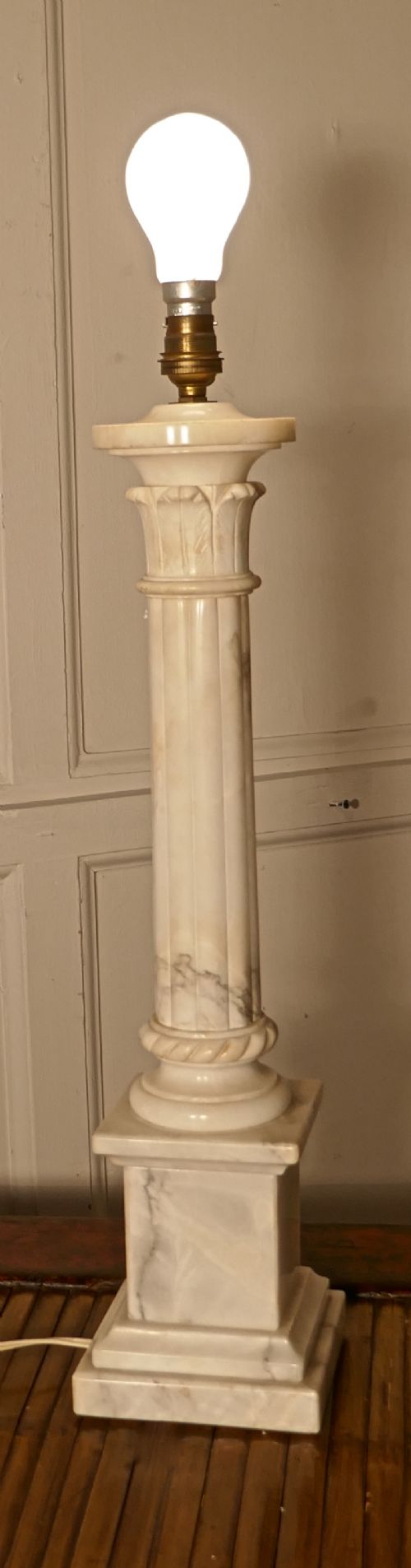tall white marble corinthian column table lamp