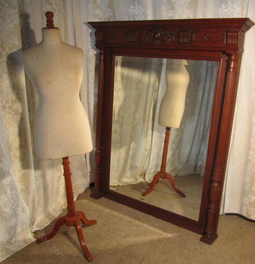 a very large french carved oak wall mirror