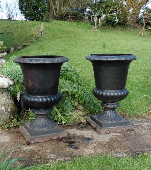 pair of very large victorian 19th century cast iron urns garden planters