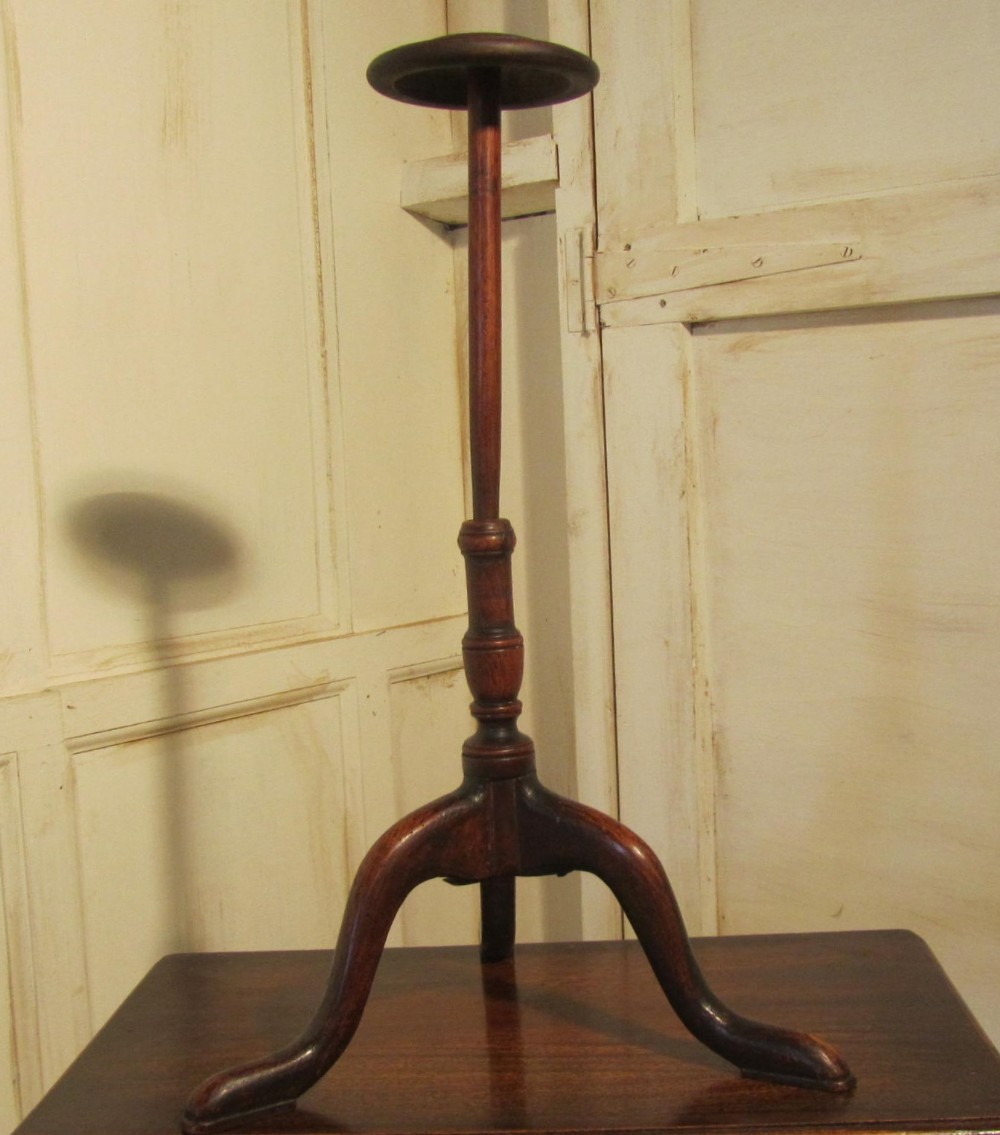 an antique wig stand hat stand shop display
