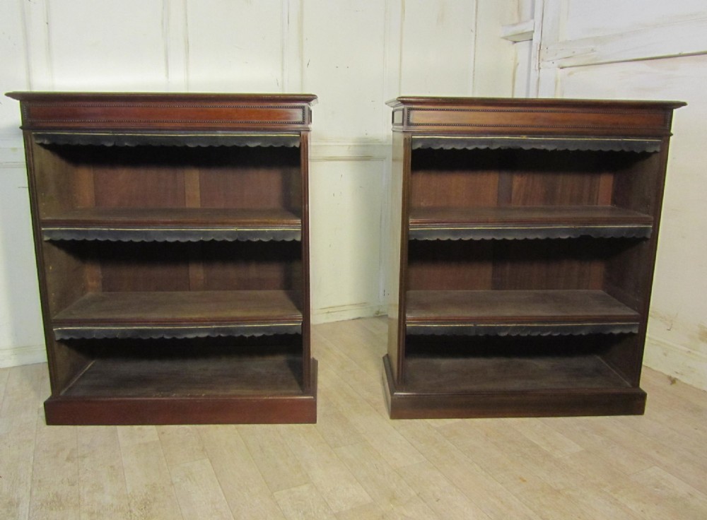 a superb pair of chippendale style mahogany open bookcases book shelves dating from 1900