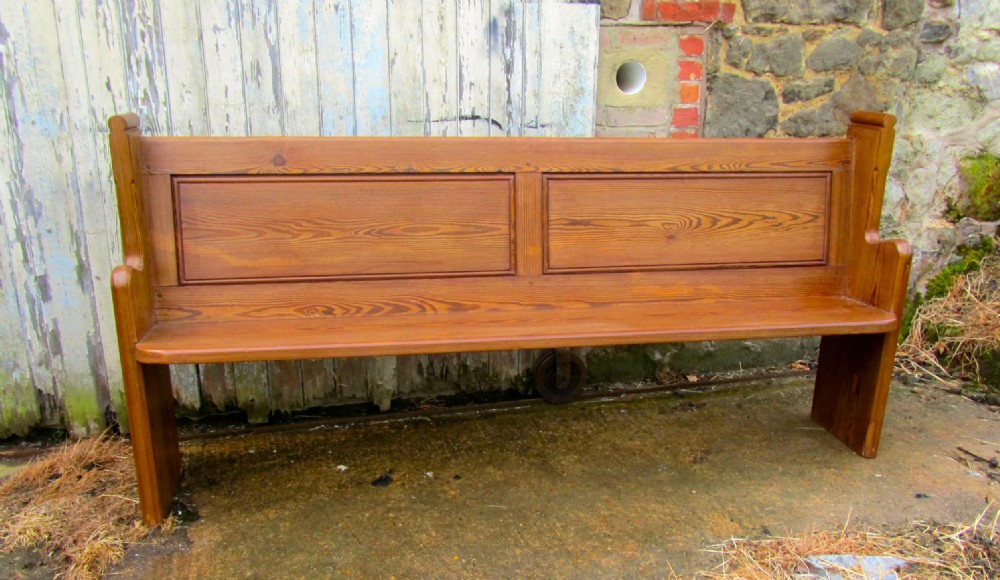 a victorian pitch pine church pew or kitchen bench