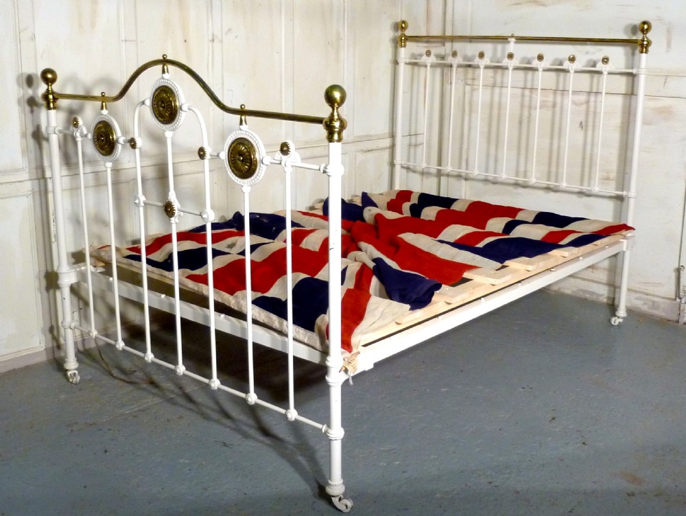 a good heavy quality white brass and iron double bed