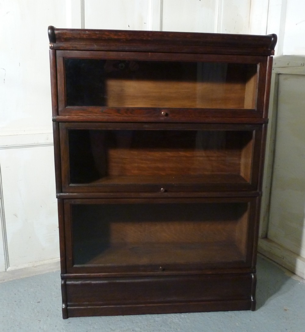a 3 stack oak globe wernicke barristers bookcase 0r filing cabinet