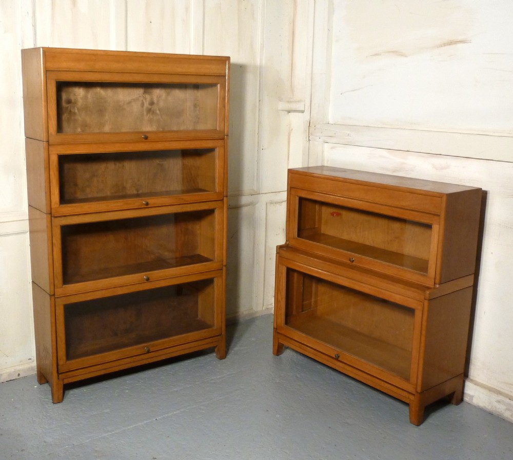 a pair of art deco golden oak barristers bookcases made by gunn