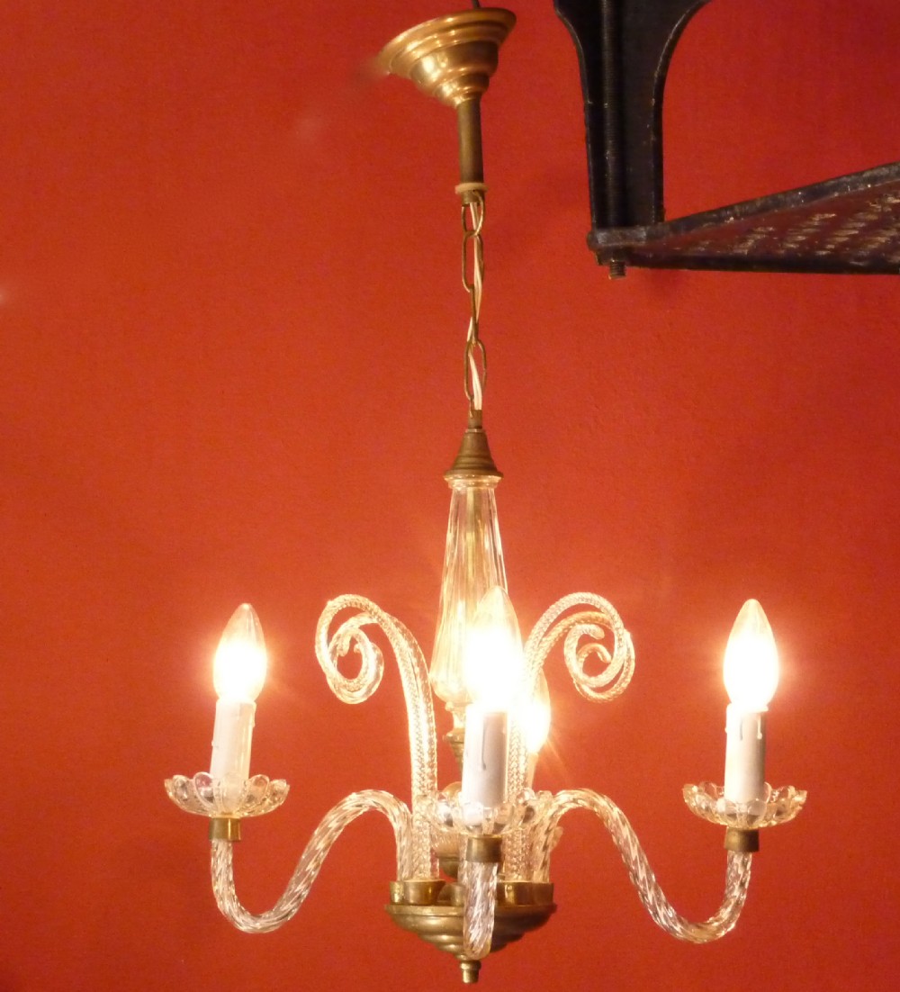 a charming murano glass and brass 4 branch chandelier