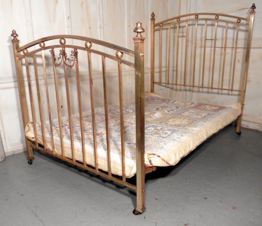 a lovely victorian brass double bed