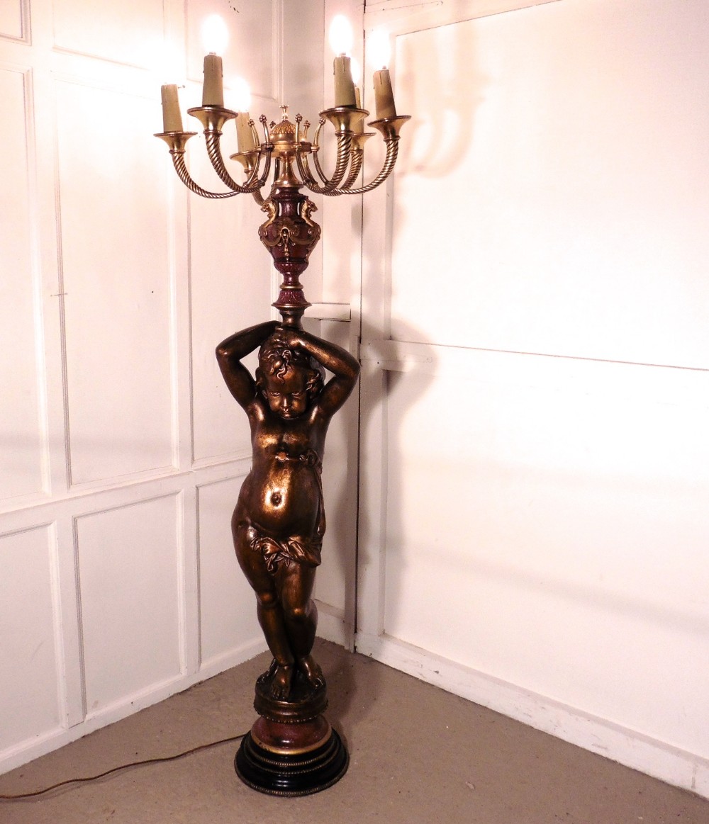 a large magnificent french bronze blackamoor candelabra
