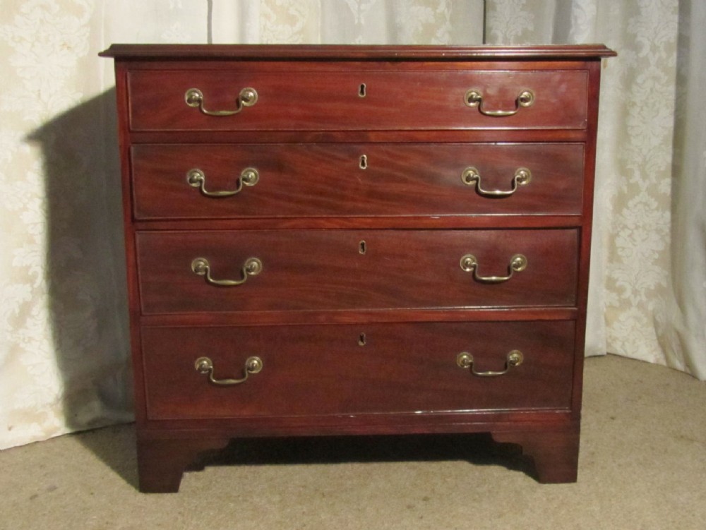 a small georgian flame mahogany chest of drawers