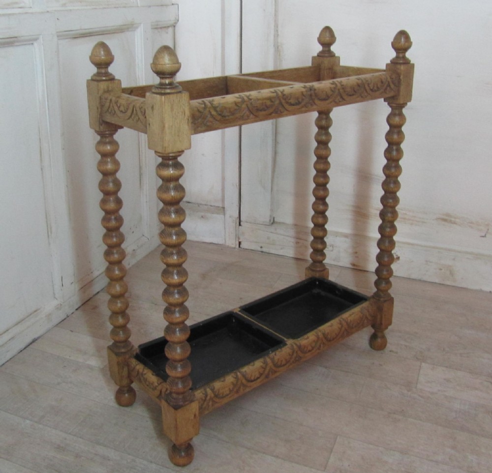 a victorian bleached oak stick stand or umbrella hall stand