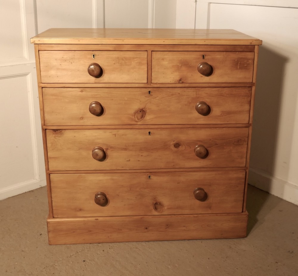 a large victorian pine chest of drawers