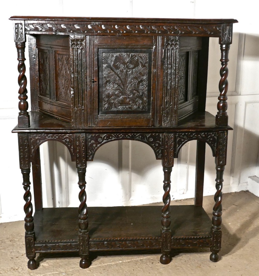 17th century carved oak court cupboard cottage size livery cupboard