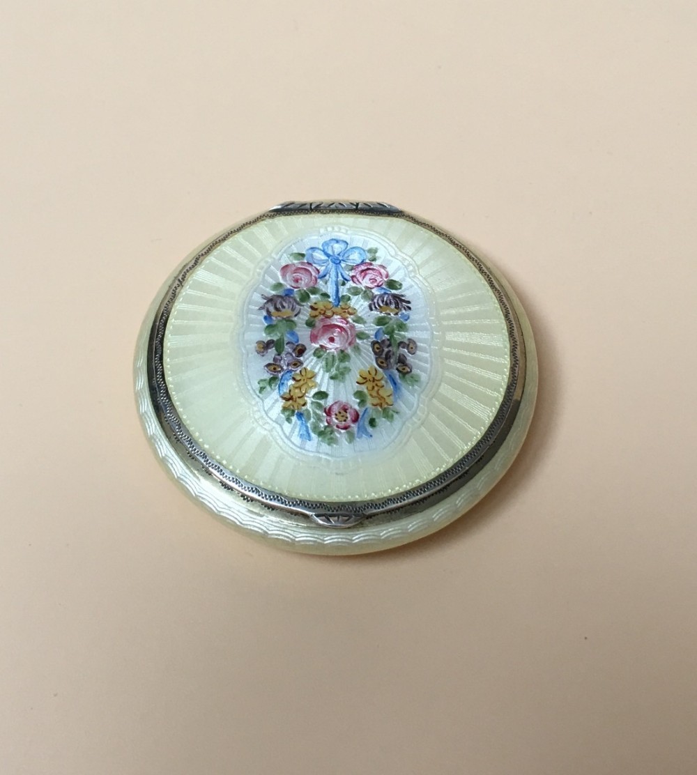 sterling silver guilloche enamel compact case with a garland of flowers