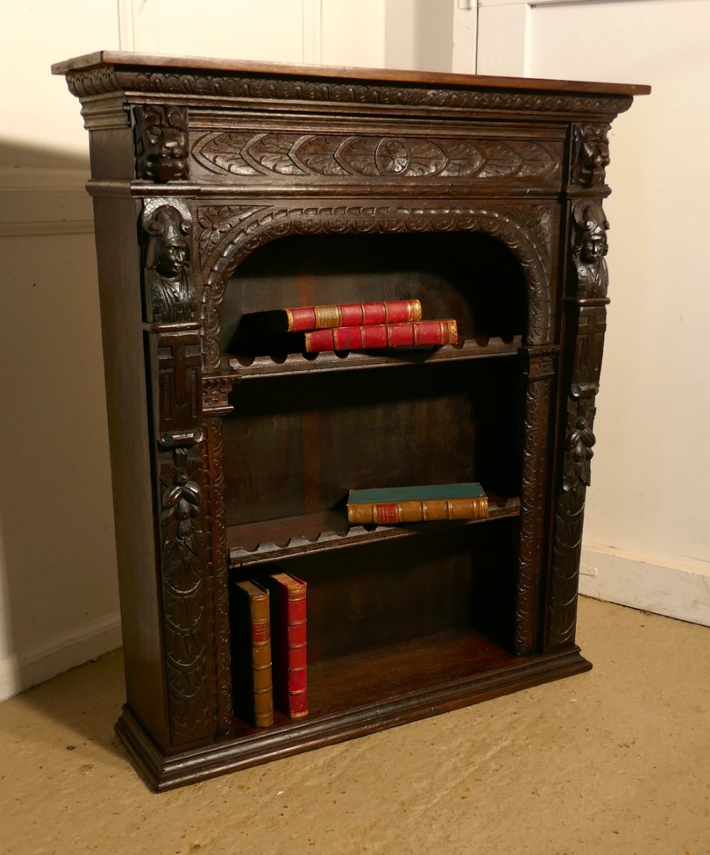 carved green man gothic oak bookcase