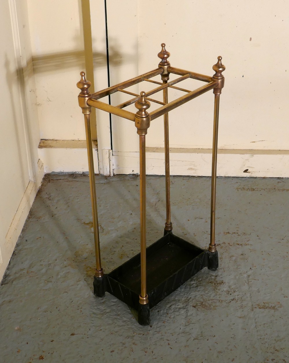 a victorian brass and cast iron walking stick stand or umbrella stand