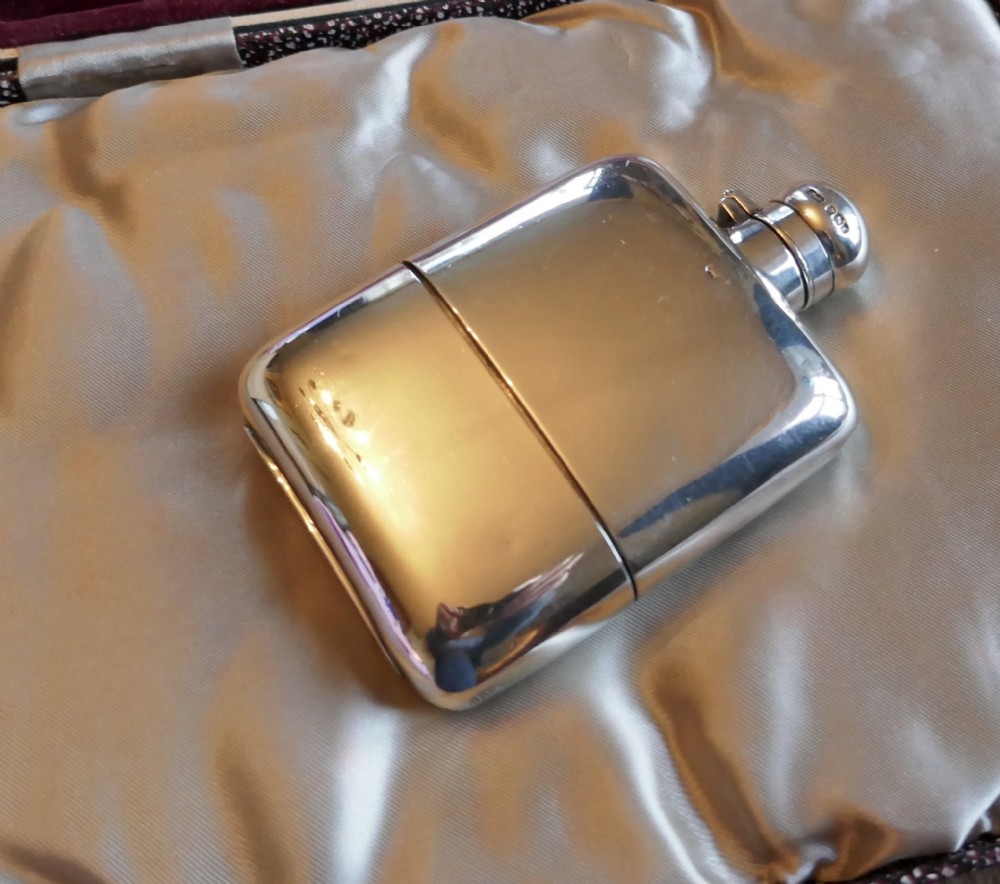 a solid silver hall marked hip flask and cup by j dixon sheffield 1909