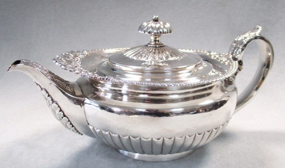 a large george iv silver teapot by william eley ii london 1823