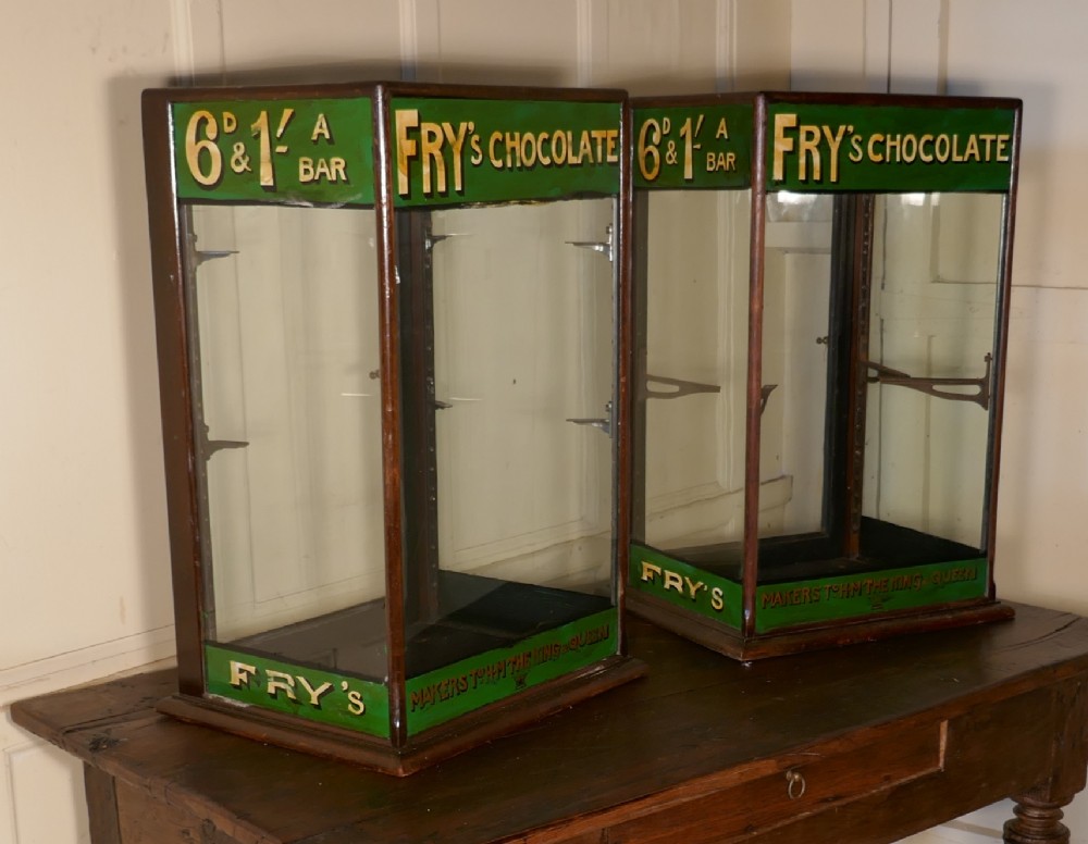a pair of edwardian frys counter top shop display cabinets sweet shop