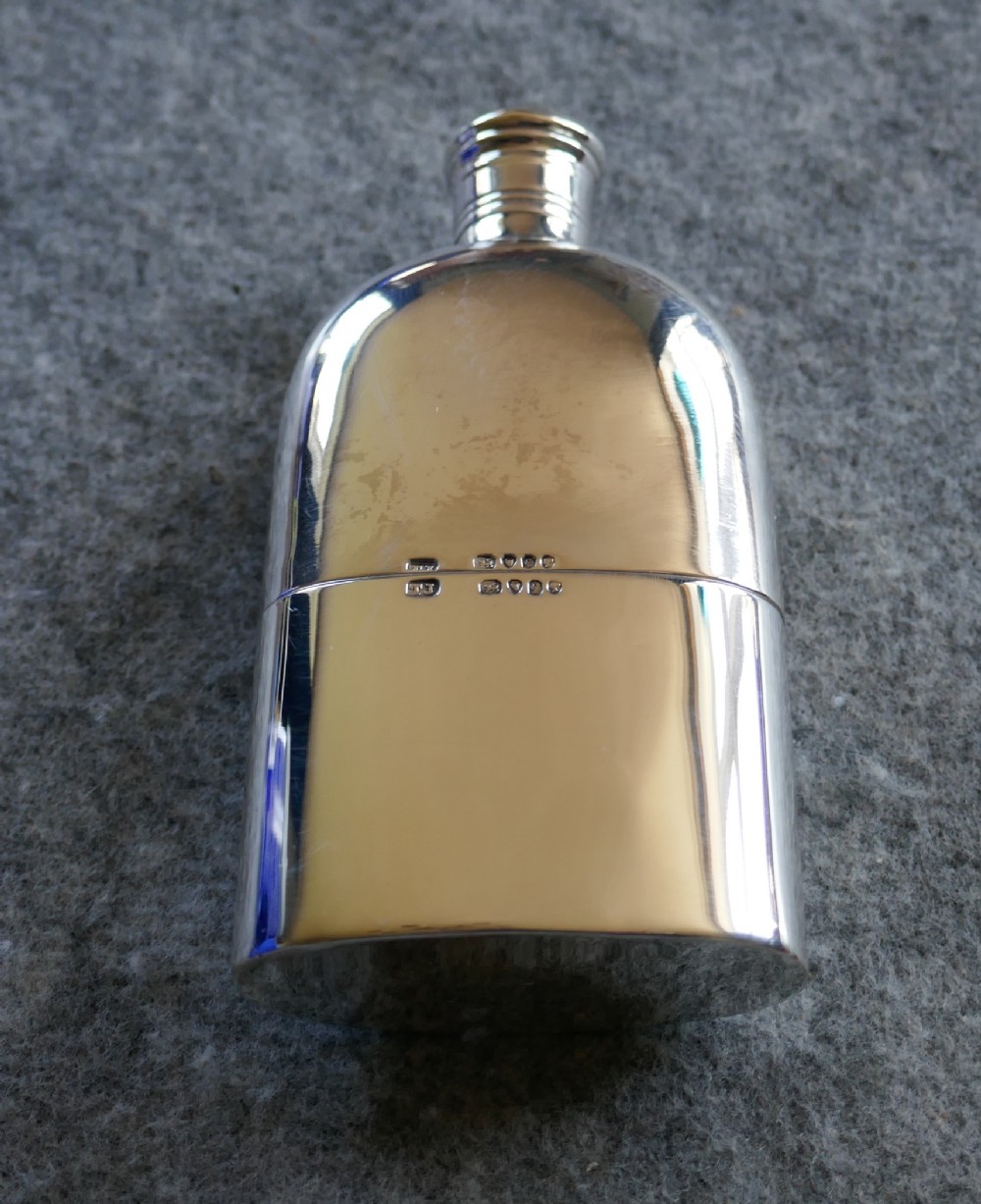 a solid silver hall marked pocket or hip flask and cup date 1888