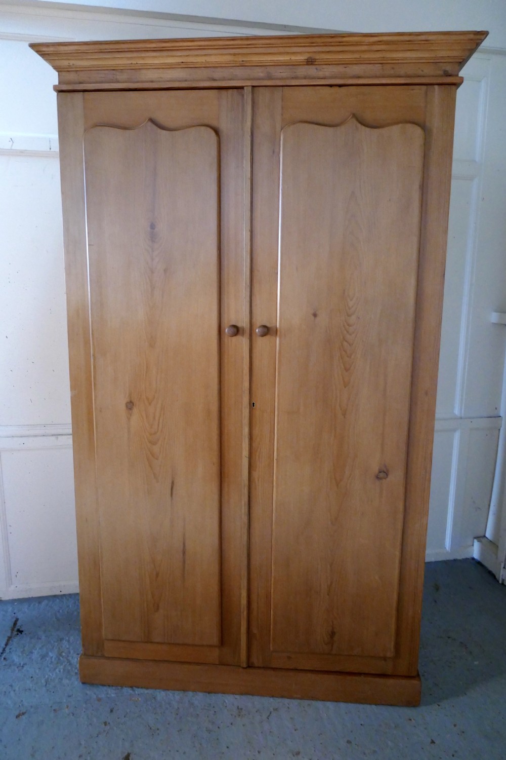 an early victorian stripped pine wardrobe