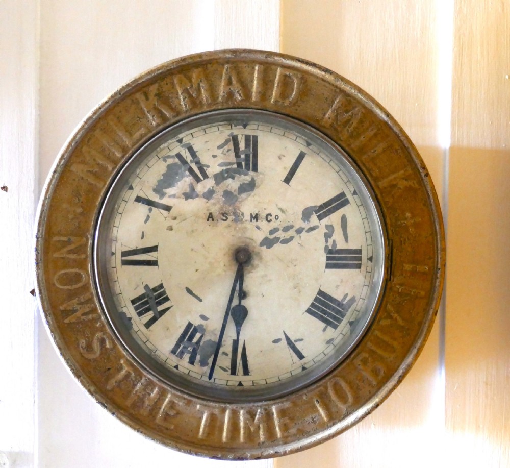 original mikmaid milk advertising clock by the ascm co