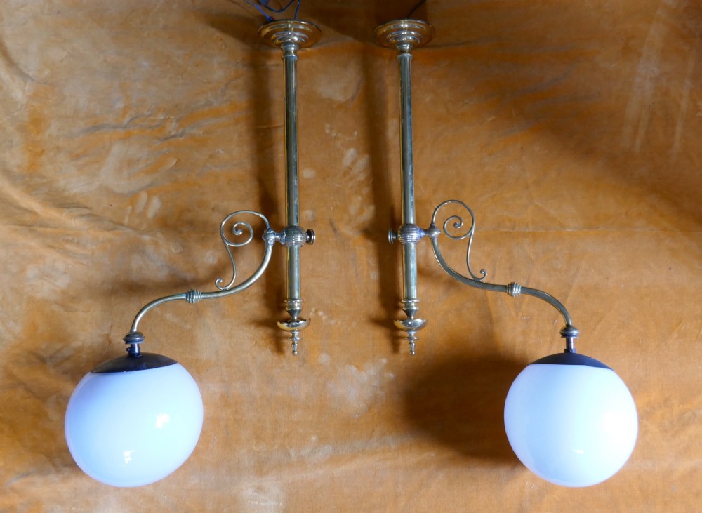 a pair of large french hanging dining table lamps