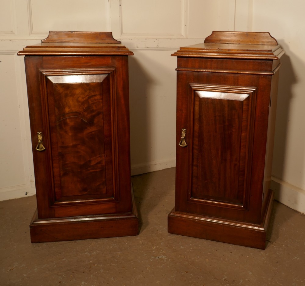 a near pair of victorian walnut bedside cupboards