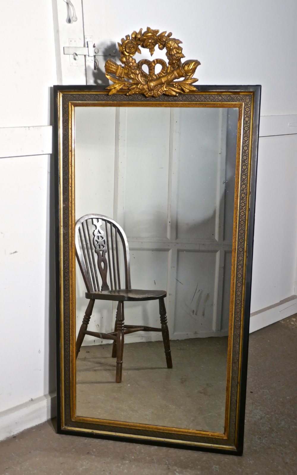 large french ebonised and gilt wall mirror torch and quiver crest