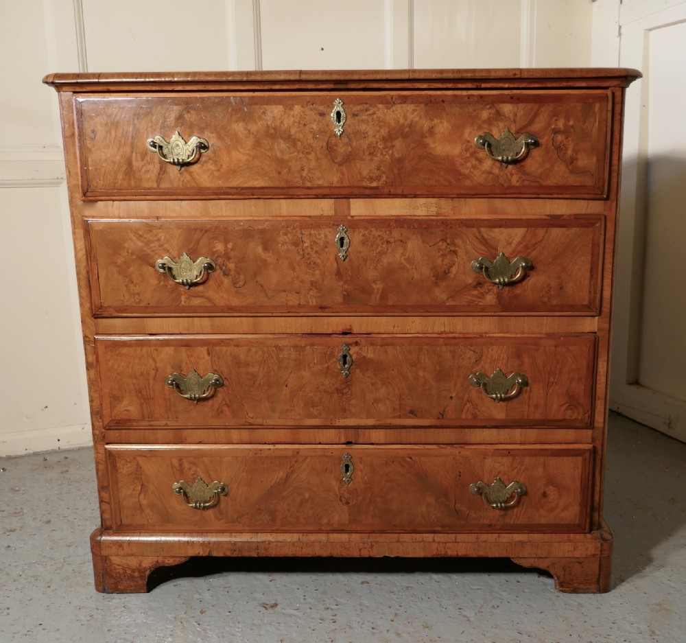 georgian inlaid walnut chest of drawers