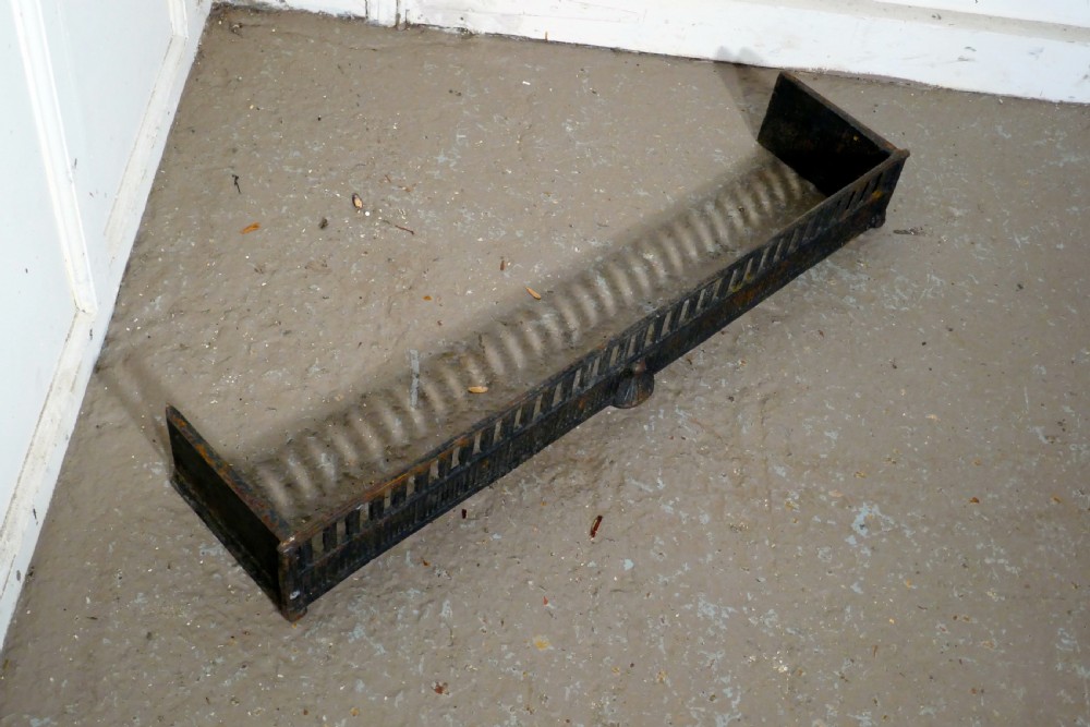 victorian cast iron fender or dog grate