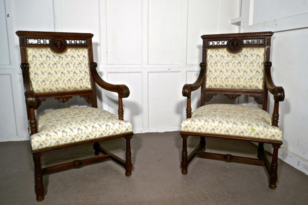 a pair of french gothic walnut library throne chairs