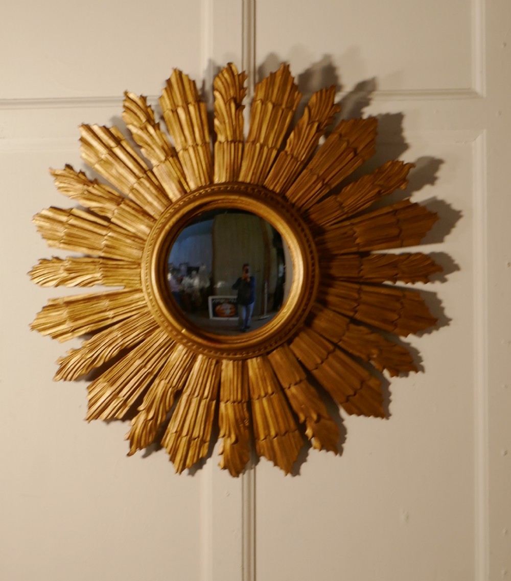 french carved wood art deco odeon style sunburststarburst convex gilt mirror