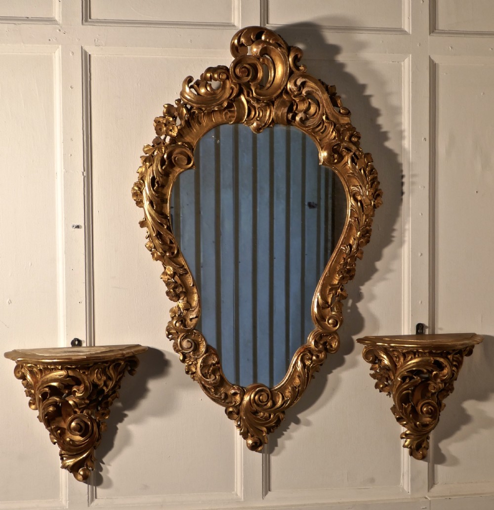 large 19th century french rococo gilt console mirror and wall brackets set
