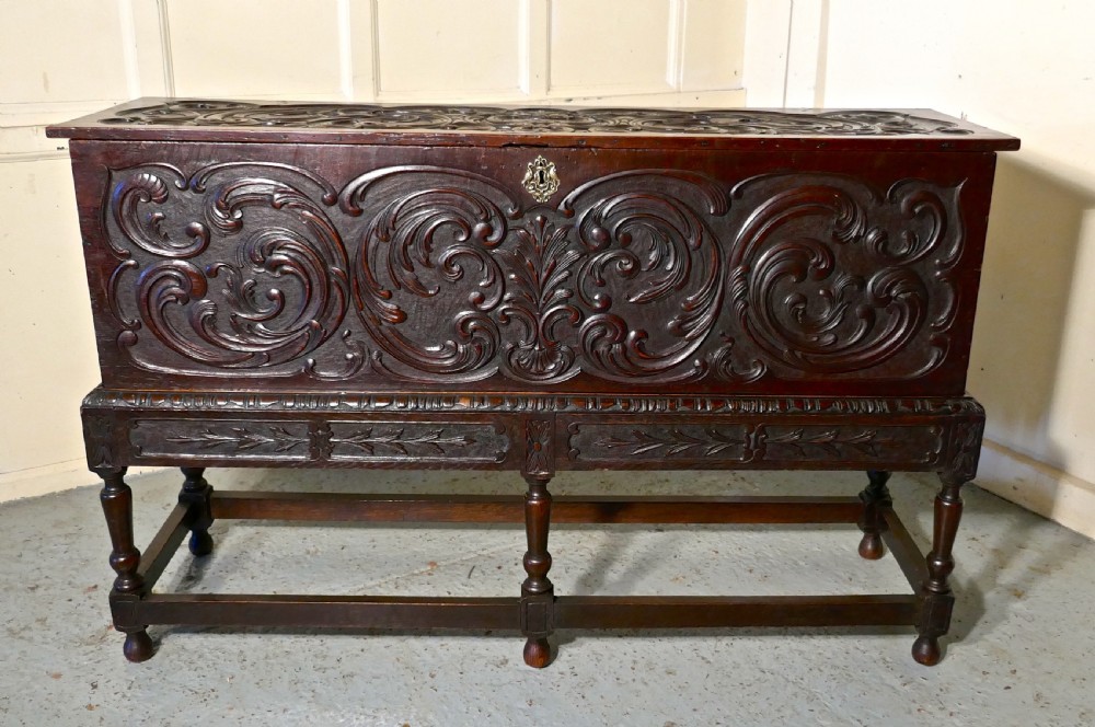 17th century carved oak sword chest on stand