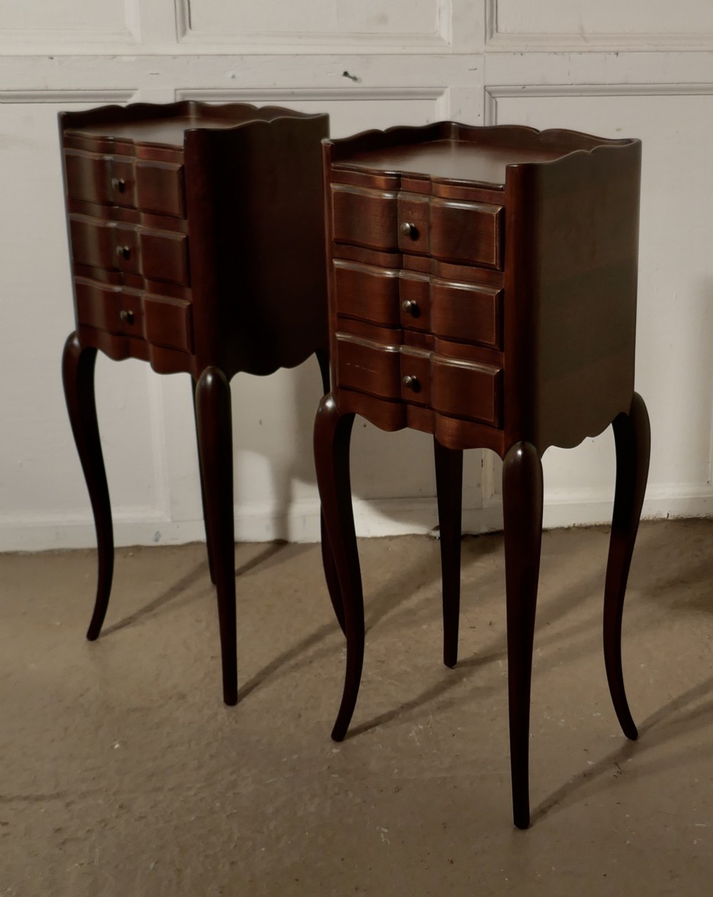 pair of french dark walnut bedside cabinets with drawers