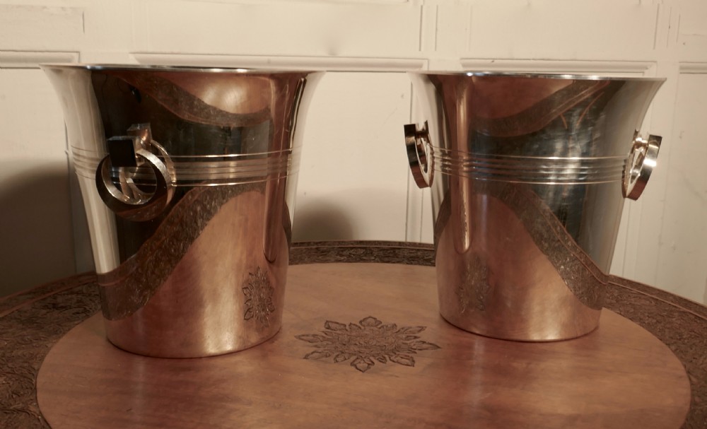 a fine pair of french art deco style wine coolers champaign ice buckets