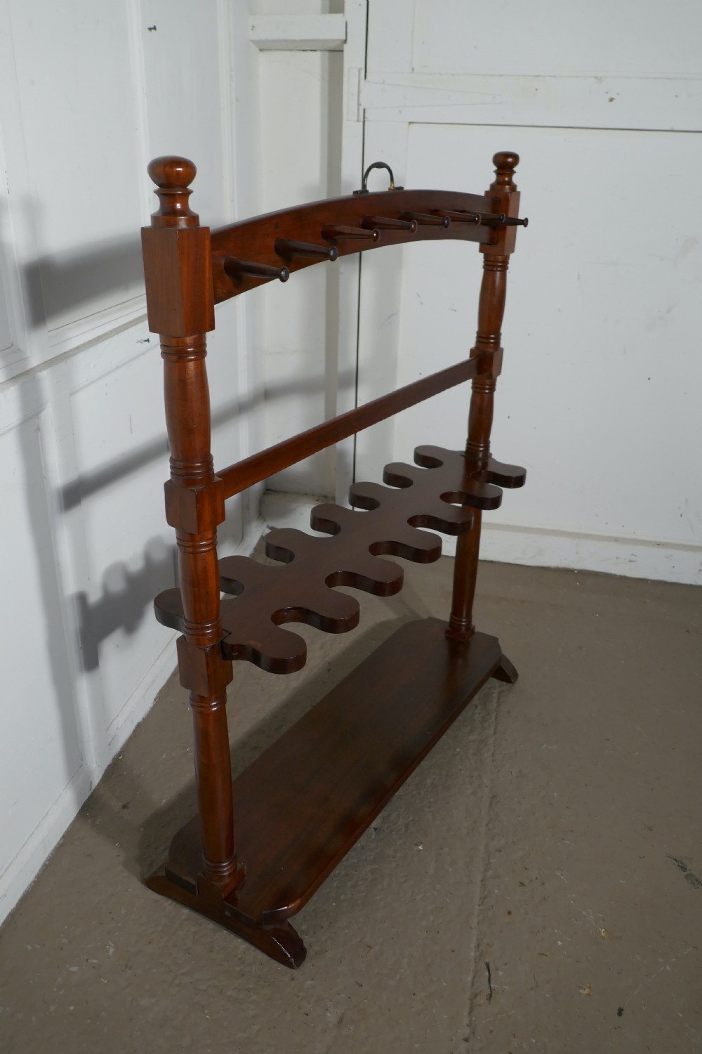 a double sided georgian mahogany boot and whip rack