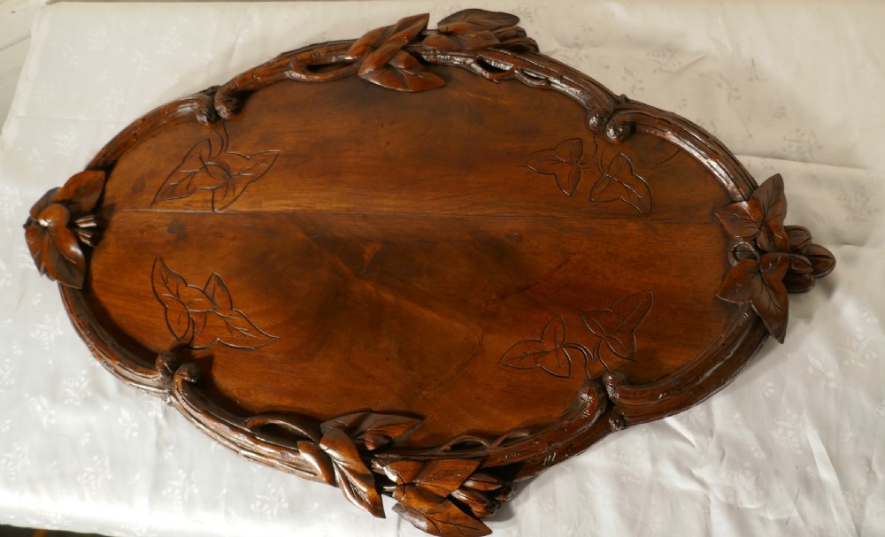 french walnut wine tray carved with vine leaves