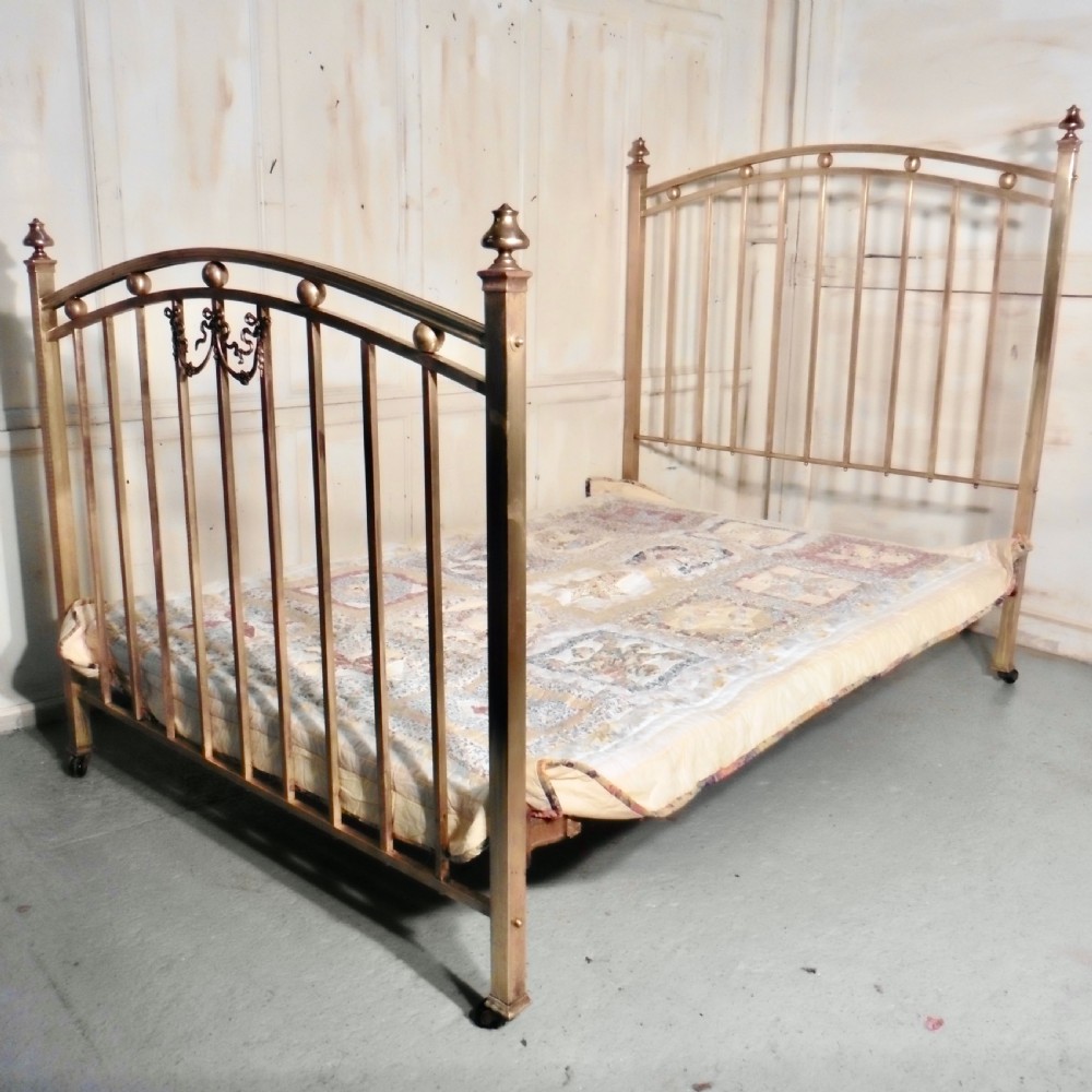 a lovely victorian brass double bed