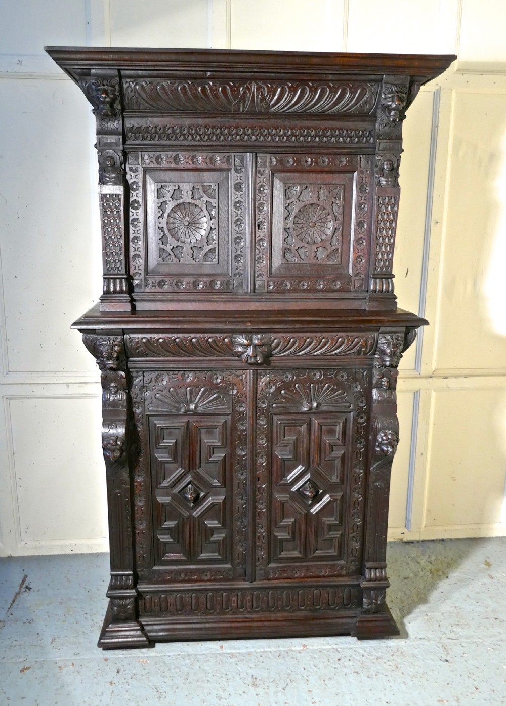 19th century carved oak housekeepers or hall cupboard